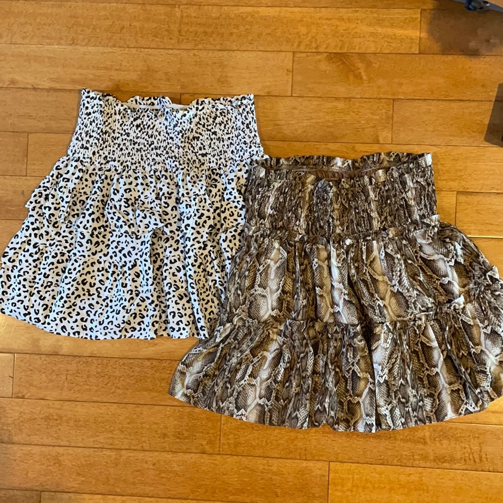 Two animal print mini skirts